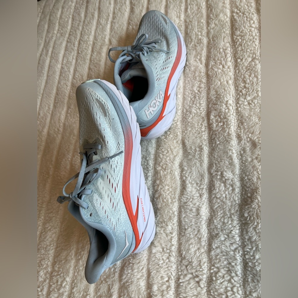 HOKA Light Blue and Orange Running Shoes